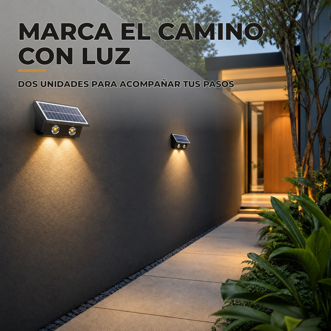 Pasillo exterior iluminado con dos lámparas solares de pared