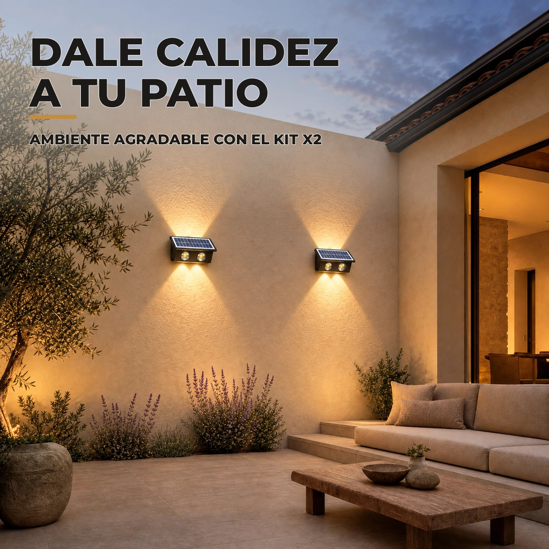 Patio con dos apliques solares negros de luz cálida