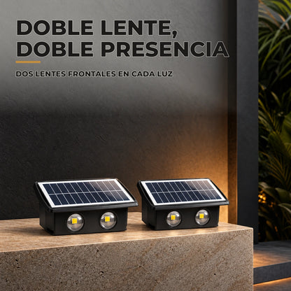 Vista frontal de dos lámparas solares negras con doble lente
